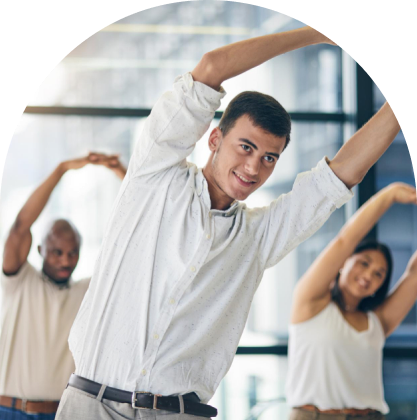 A corporate yoga session in an office environment